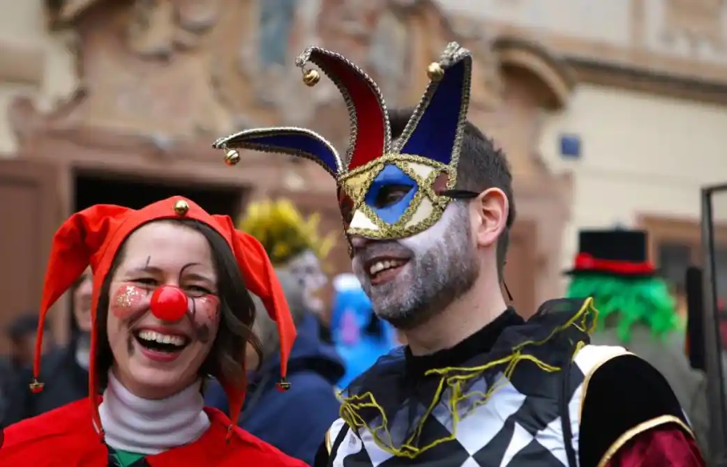 people dressed up in carnival outfits